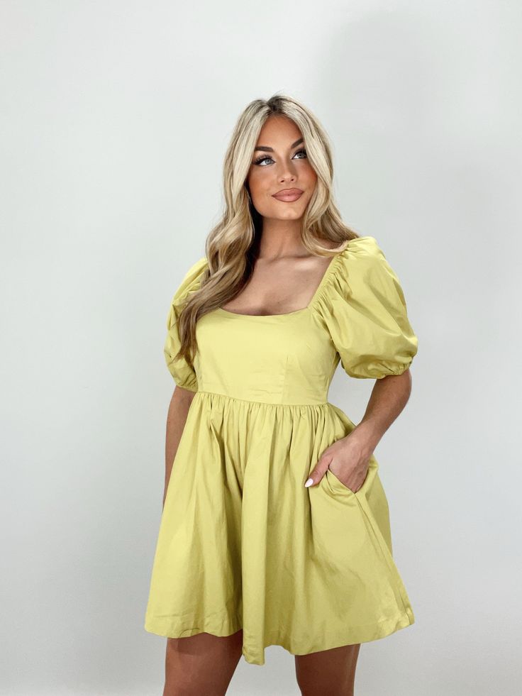 Hit the town with your sassiest look yet in the Lime Babydoll Romper! With its puff sleeves and strappy back, this romper is sure to turn heads. Its elastic waistband and inner lining will keep you comfortable all day, while its flattering and flirty silhouette will make you feel your best. A one-stop shop for cuteness! 100% Rayon Hand Wash Cold Summer Puff Sleeve Mini Dress For Day Out, Spring Casual Solid Color Bubble Romper, Cute Puff Sleeve Dress For Summer, Cute Puff Sleeve Dress With Balloon Sleeves For Summer, Puff Sleeve Dress With Smocked Back For Day Out, Spring Casual Solid Bubble Romper, Green Spring Dresses With Elastic Shoulders, Spring Green Dresses With Elastic Shoulders, Solid Color Short Sleeve Bubble Romper For Spring