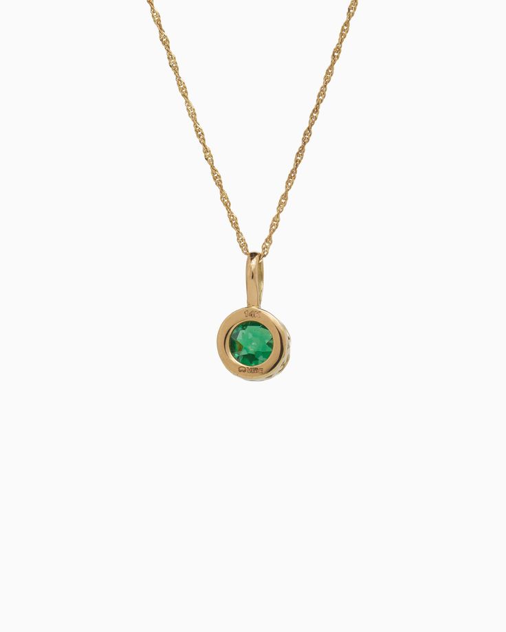 Crafted in 14K solid gold, the Princess Petroglyph Stone Pendant features a faceted green zircon stone encircled by intricate petroglyphs. Its unique design adds a touch of elegance to any outfit, and pairs wonderfully with our Princess Petroglyph Stone Studs. Metal: 14K solid gold Stone: Green zircon Dimensions: 16mm x 8mm Stone Size: 8mm Style #: GP160GZ Hook Bracelet, Stone Studs, Gold Piece, Handmade Design, Stone Pendants, Solid Gold, Unique Designs, Sterling Silver, Stone