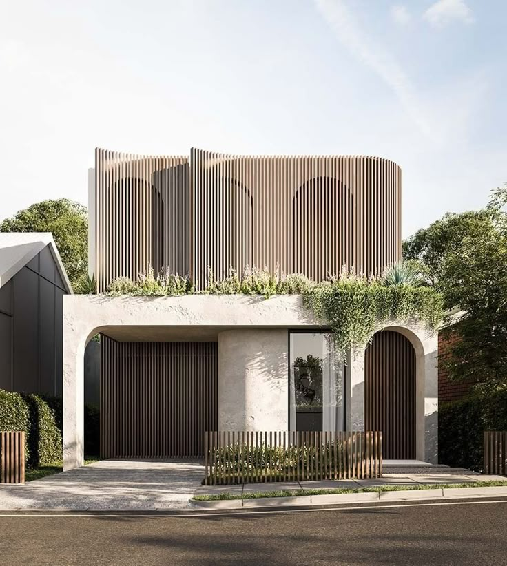 an architecturally designed house with wooden slats on the front and side walls, surrounded by greenery