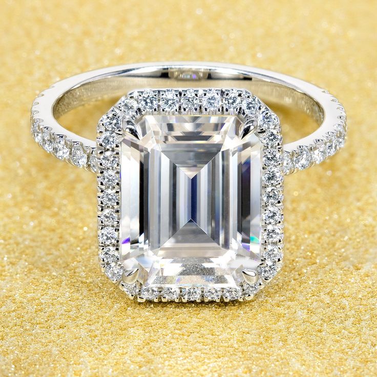 14K Gold Classic 3.5ct Emerald-cut Halo Moissanite and Diamond Engagement Ring | Earthena Jewelry Emerald Cut Halo Ring, Classic Halo Engagement Ring, Wedding Rings Emerald Cut, Emerald Cut Halo, Classic Romance, Basket Setting, Emerald Cut Moissanite, Diamond Halo Engagement Ring, Classic Engagement Rings