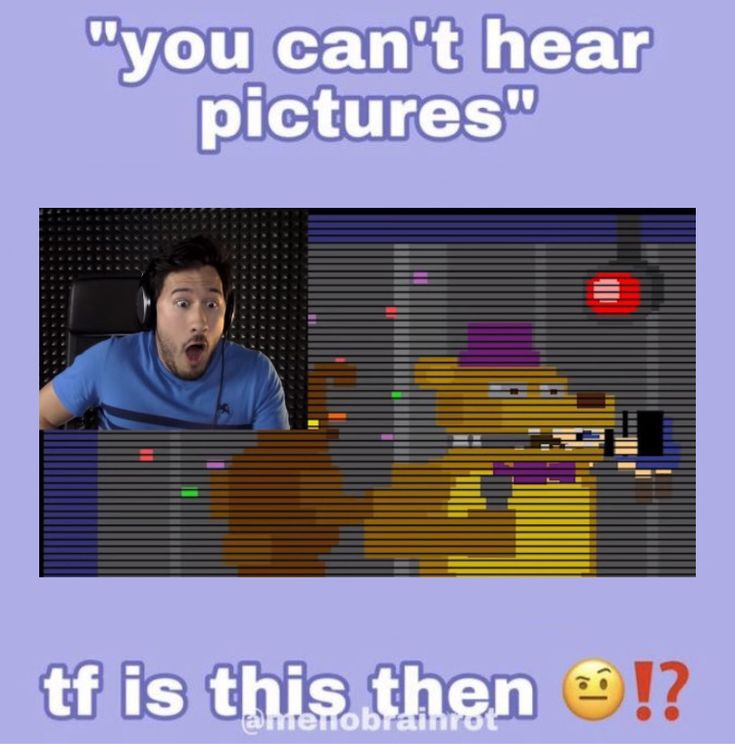 a man is sitting in front of a computer screen with the words, you can't hear pictures