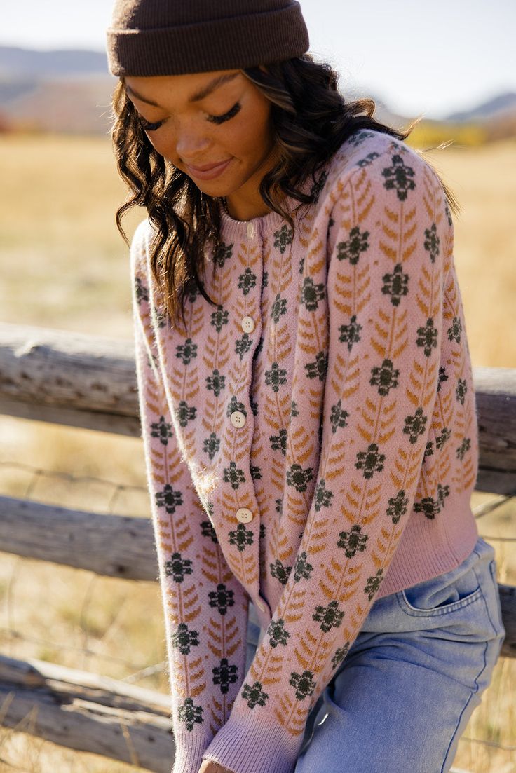 The Meadow Floral Cardigan is one you want in your closet. Featuring floral material, functional buttons, and thick material, this pretty pink cardi will bring some joy to those gloomy winter days! // paired with the on my own tie waist pants Winter Floral Print Pink Outerwear, Winter Pink Floral Print Outerwear, Winter Floral Print Long Sleeve Cardigan, Winter Pink Outerwear With Floral Print, Vintage Floral Print Winter Cardigan, Vintage Floral Print Cardigan For Fall, Fall Vintage Floral Print Cardigan, Vintage Floral Print Cardigan For Winter, Pink Floral Print Outerwear For Fall