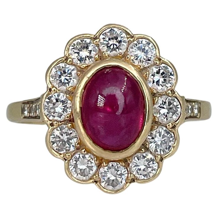 This is a vintage cluster ring crafted in 18K white gold. Circa 1970. The piece features: - 1 ruby (oval cabochon cut, 1.90ct, slpR 6/4, SI) - 20 diamonds (round brilliant cut, TW 1.00ct, RW+/W, VS-SI) The ball inside the shank keeps the ring stable on the finger. Weight: 3.96g Size: 18.5 (US 8.5) IMPORTANT: please ask about the possibility to resize before purchase. ——— If you have any questions, please feel free to ask. We describe our items accurately. Please note that in reality they can loo Vintage Cluster Ring, David Webb, Diamond Brooch, Estilo Art Deco, Ring Crafts, Christian Lacroix, Diamond Cluster Ring, Ruby Ring, Rose Cut Diamond