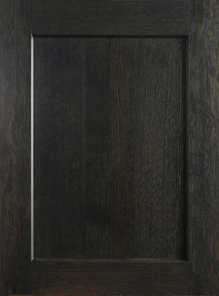 a close up view of a wooden frame with black woodgrain and white trim