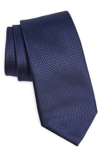 Small, neat patterns bring understated distinction to a tie crafted from Italian silk jacquard and styled to smartly finish any formal look. 3 1/2" width; 58" length 100% silk Spot clean Made in Italy Blue Silk Suit And Tie Accessories For Work, Blue Silk Suit And Tie Accessories For Office, Blue Silk Tie For Workwear, Blue Silk Ties For Work, Blue Silk Ties For Business, Tailored Blue Formal Tie, Blue Tailored Ties For Business, Blue Silk Ties For Semi-formal Occasions, Silk Suit And Tie Accessories For Semi-formal Occasions