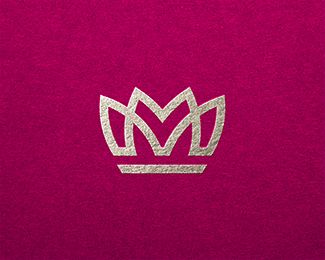 a pink towel with a silver crown on it's front and bottom corner,