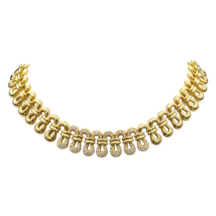 Stylish 18 karat Gold choker necklace set with 2.6 carats of high quality pave set round brilliant cut diamonds ( F-G color, VVS-VS clarity). It is fully articulated and sits perfectly on the neck, the make is excellent. Length 38 cm Weight 95.2 grams Gold Choker Necklace Set, Antique Choker, Gold And Diamond Necklace, Gold Link Necklace, Diamond Choker Necklace, Diamond Choker, Choker Necklace Set, Blue Sapphire Diamond, Enamel Necklaces