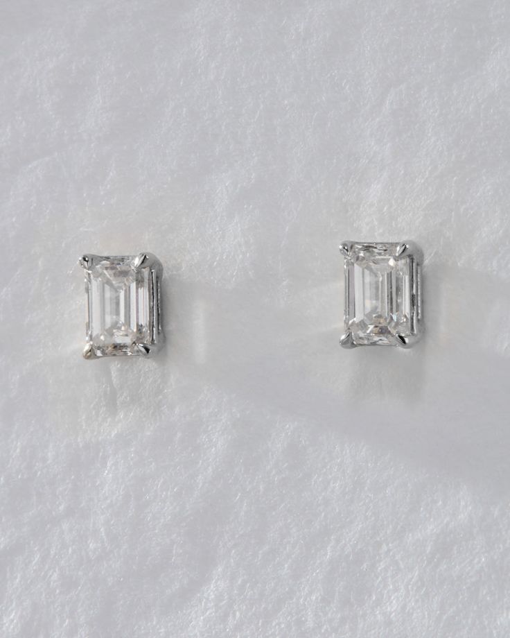 Our Ultimate Diamond Stud Earrings are a modern-take on the classic and timeless solitaire diamond studs. These stunning earrings feature a emerald-cut brilliant diamond with modern prong settings that are perfect for everyday wear. With a high shine finish and comfortable fit, they're the ideal choice for any lobe piercing. Available in 0.5ct and 1ct sizes for a luxe look. Goals 2025, Personalised Jewellery Necklaces, Diamond Solitaire Earrings, Diamond Pendants Designs, Diamond Pendants, Lobe Piercing, Solitaire Earrings, 2025 Vision, Solitaire Studs