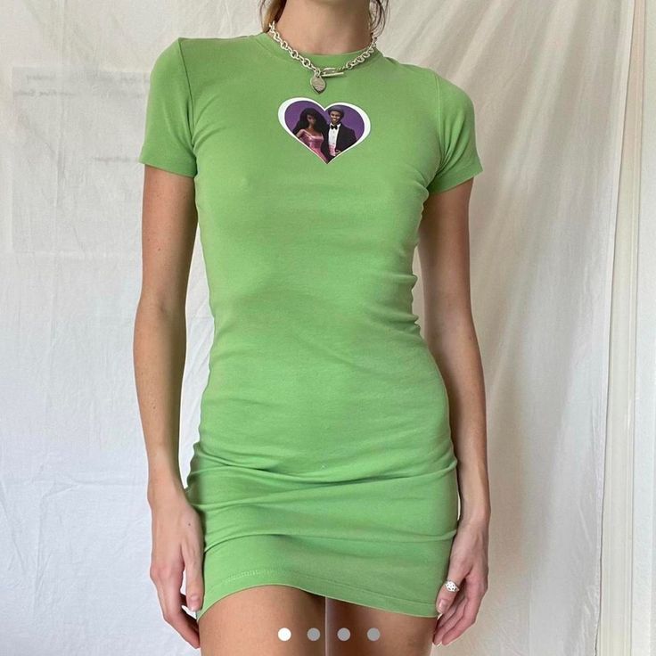 Brand New Green T Shirt Bodycon Mini Dress With Barbie And Ken Heart Print Length: 34in Y2k Fitted Mini Dress With Short Sleeves, Y2k Style Short Sleeve Mini Dress For Summer, Y2k Summer Dress With Short Sleeves, Y2k Style Short Sleeve Summer Mini Dress, Fitted Cotton Mini Dress With Crew Neck, Crew Neck Fitted Cotton Mini Dress, Fitted Crew Neck Cotton Mini Dress, Green Stretch Mini Dress With Short Sleeves, Fitted Mini Dress With Graphic Print And Short Sleeves