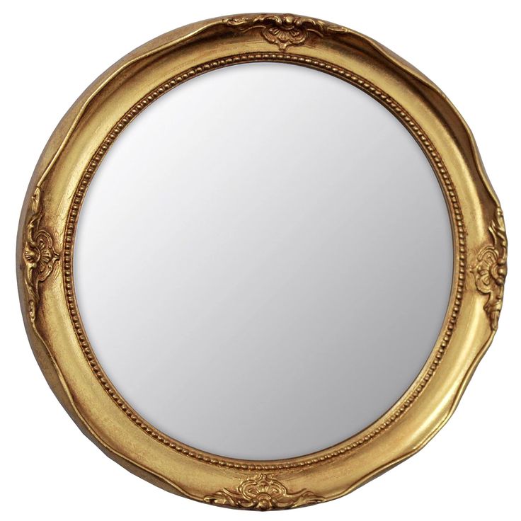 a gold framed mirror on a white background