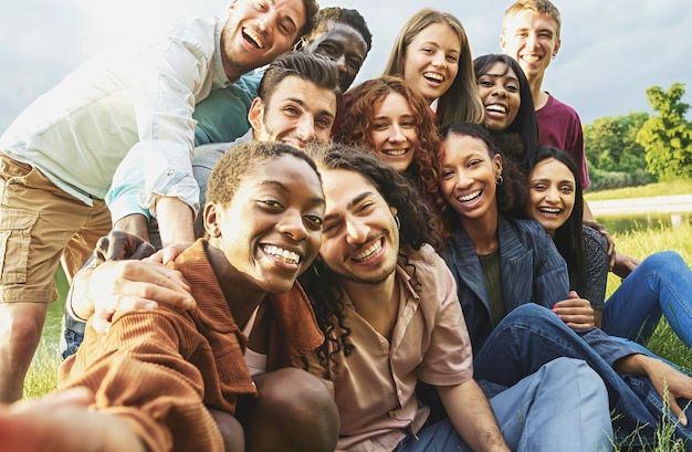 a group of young people are smiling for the camera