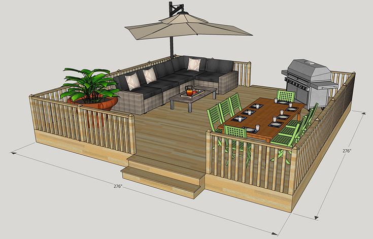 a deck with an umbrella over it and seating area on the other side is shown