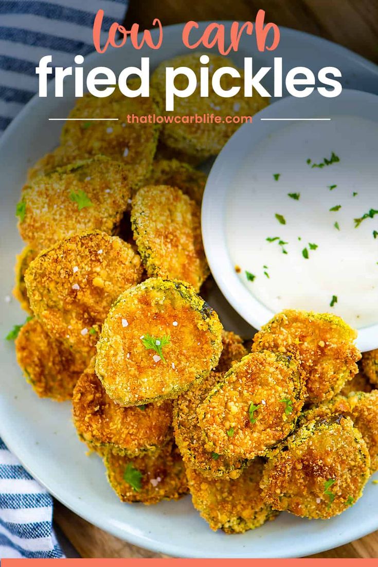 fried pickles on a white plate with ranch dip in the background and text overlay that reads low carb fried pickles