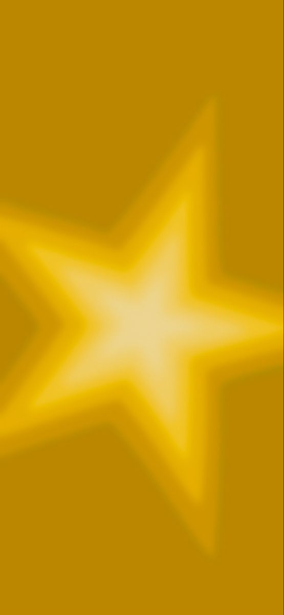 a yellow background with a white star in the center and light at the bottom that appears to be blurry