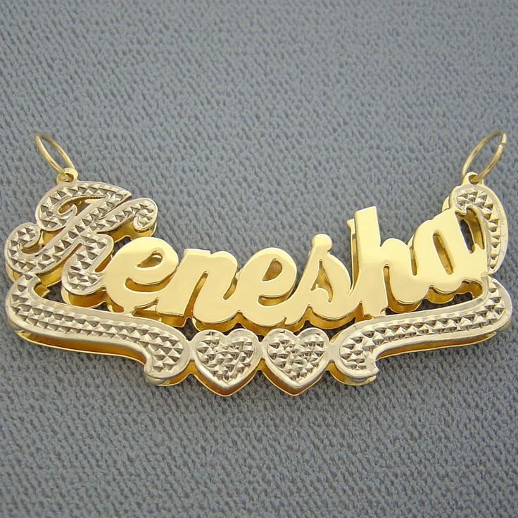 "*2 Inches Wide Personalized Solid 10K or 14K Gold Name Pendant 3D Double Plates Charm, fancy script unique font design, capitalized first letter and bottom heart design tail in white tone Rhodium hand carved diamond accent and lower cases letters finished in high-polished. *Average Name Pendant Dimension: 2 Inch (50 mm) X 3/4 Inch (19 mm) Approx. *Up to 9 Letters - Only first letter capitalized. *Thickness Top: 0.7 mm / 22 Gauge / 0.028\" Approx. *Thickness Bottom: 0.40 mm / 26 Gauges / 0.018\" Anniversary Nameplate Name Necklace With Hallmarks, Custom Gold Nameplate Jewelry, Luxury Gold Nameplate Necklace, Luxury Gold Custom Name Necklace, Gold Jewelry With Names For Formal Occasions, Gold Formal Jewelry With Names, Formal Gold Jewelry With Names, Luxury Gold Name Necklace With Custom Name, Gold Nameplate Necklace For Anniversary