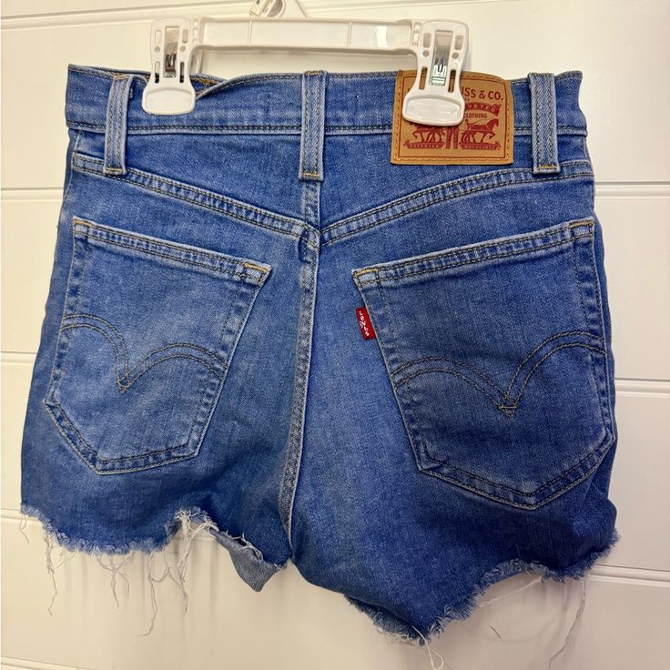 Size 23, Brand New Levi's Jean Shorts In Medium Wash For Summer, Levi's Denim Blue Cotton Bottoms, Levi's Denim Blue Jean Shorts For Summer, Levi's Light Wash Summer Jeans, Levi's Relaxed Fit Denim Bottoms, Trendy Levi's Bottoms With Frayed Hem, Levi's Mid-rise Denim Blue Bottoms, Levi's Mid-rise Jean Shorts For Summer, Levi's Straight Leg Medium Wash Jean Shorts