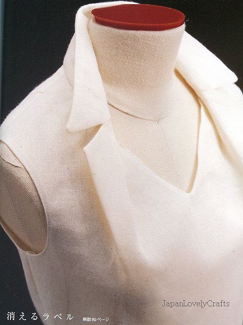 an image of a mannequin's neck and collar on display in a magazine