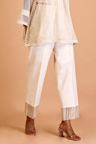 Ivory short kurta in jute silk base with floral thread embroidery and lace details. Paired with an inner and pant. - Aza Fashions Traditional Festive Linen Pants, Festive Traditional Linen Pants, Spring Embroidered Straight Pants, White Bottoms With Resham Embroidery For Spring, Summer Straight Pants With Embroidered Border, White Cotton Pants With Resham Embroidery, Kurta Pant Set, Short Kurta, Top And Pants Set