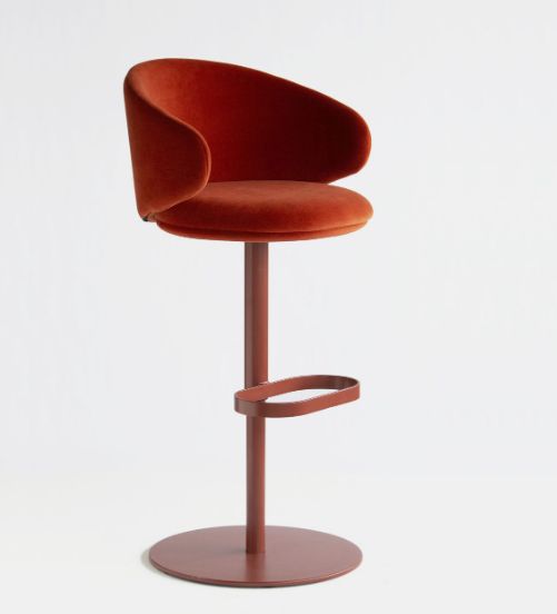 an orange stool with a red seat and foot rest in front of a white background