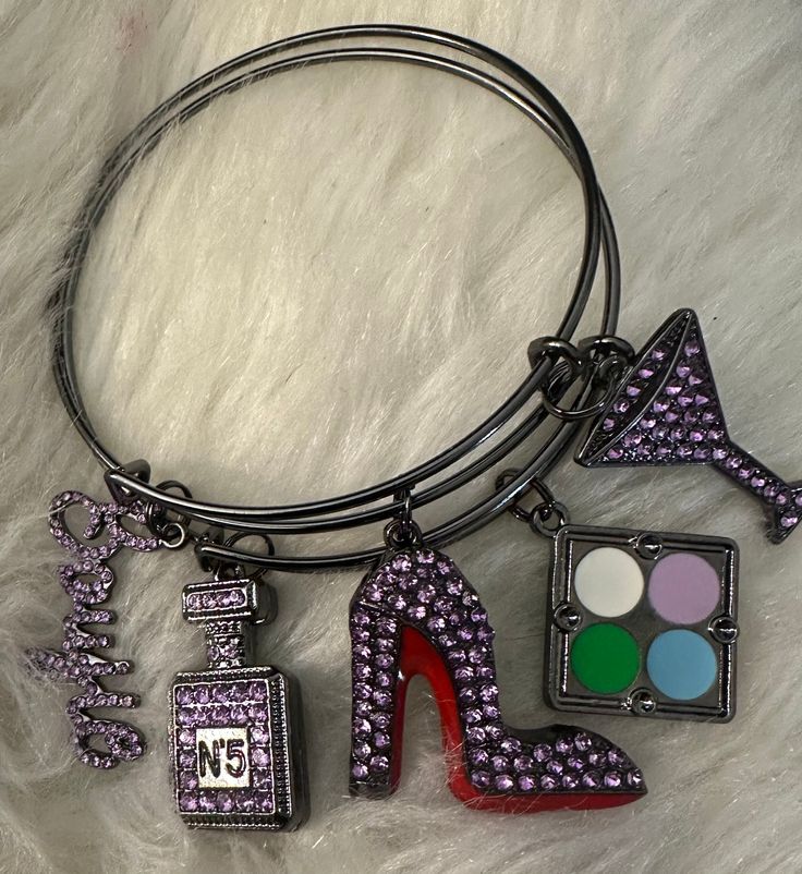 Boujie, perfume bottle, martini bottle and red bottom shoe.  Lavender bling. Elegant Purple Bracelets For Party, Purple Metal Bracelet For Party, Purple Metal Bracelets For Party, Lavender Bangles, Martini Bottle, Luxury Vintage Purple Bracelets, Spiritual Lavender Hand-strung Bracelet, Bohemian Lavender Hand-strung Jewelry, Red Bottom Shoes