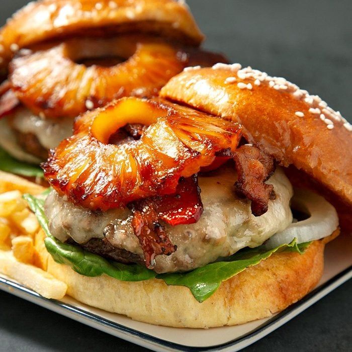 a bacon and pineapple burger on a bun