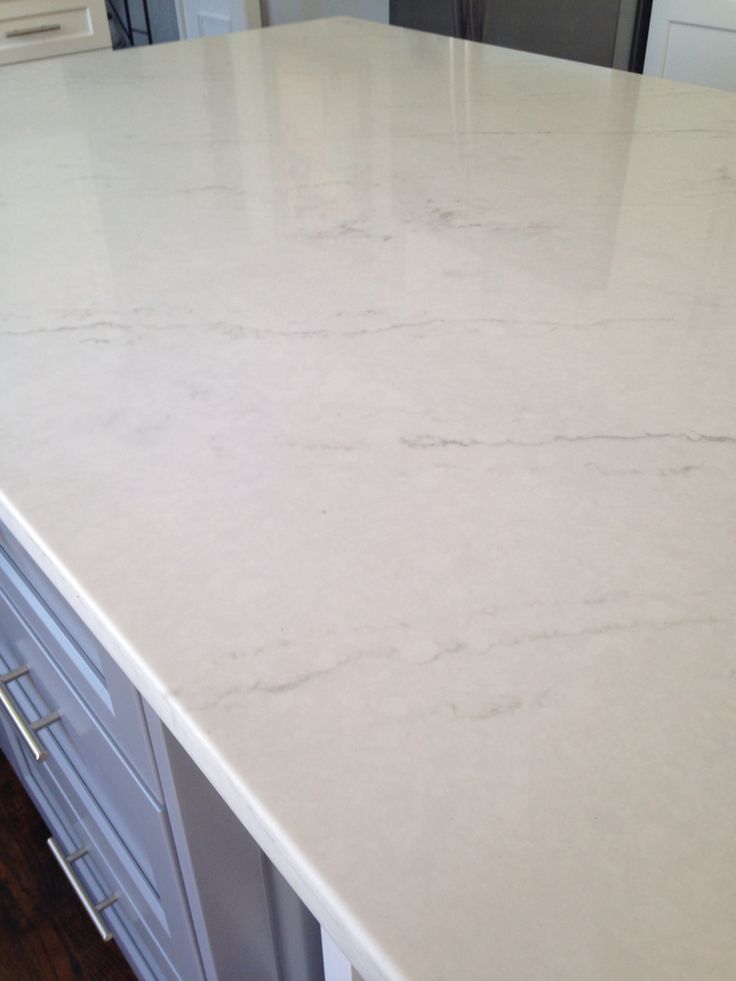 a white counter top in a kitchen