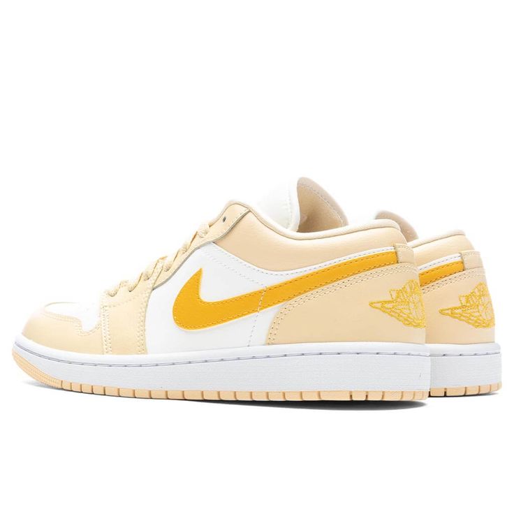 Inspired by the 1985 original AJ1, the Air Jordan 1 Low Shoe offers a clean, classic look in a low-cut model that's perfect for casual wear. Pictured is the Air Jordan 1 Low in Sail/Yellow Ochre/Pale Vanilla. DUE TO THE LIMITED NATURE OF THIS PRODUCT, ALL SALES ARE FINAL. THIS ITEM IS NOT ELIGIBLE FOR DISCOUNTS OR SPECIAL PROMOTIONS. Leather and synthetic upper Air-Sole unit Rubber outsole All sizes are listed in U.S. Women's sizing unless stated otherwise Style no: DC0774-170 Nike Jordan Yellow, Yellow Shoes Aesthetic, Jordan 1 Low Yellow, Yellow Dunks, Yellow Nike Shoes, Air Jordan 1 Low Women, Jordan 1 Low Women, Yellow Preppy, Blue Air Max