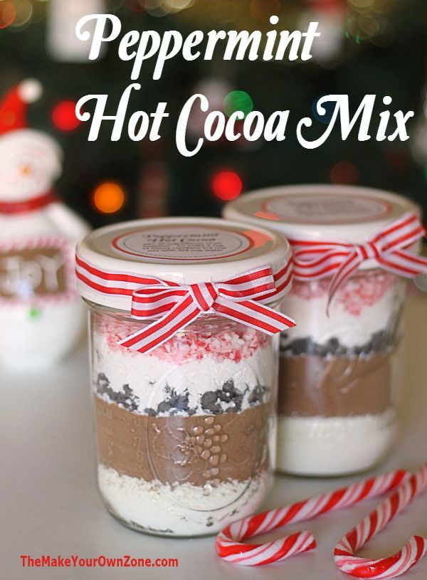 peppermint hot cocoa mix in jars with candy canes