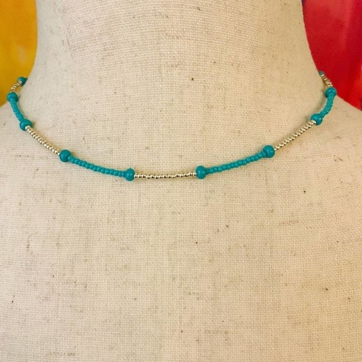 14” Turquoise And Silver Choker. 2.5” Extension. Dainty Seed Bead Choker. Hand Made With Seed Beads. Findings Silver Tone P1 Adjustable Turquoise Necklace For Summer, Blue Jewelry With Silver Beads For Summer, Blue Turquoise Necklace For Summer Beach, Handmade Blue Turquoise Necklace For Summer, Adjustable Blue Turquoise Necklace With Silver Beads, Adjustable Blue Beaded Turquoise Necklace, Blue Turquoise Necklace With Beaded Chain For Beach, Adjustable Turquoise Beaded Necklace With Silver Beads, Adjustable Blue Beaded Necklace With Silver Beads