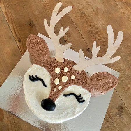 a cake decorated to look like a deer's head