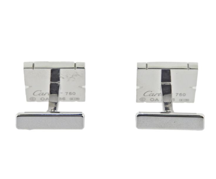 Pair of Cartier Tank Francaise cufflinks in 18k white gold, with approx. 0.54ctw G/VS diamonds. Come with box and service paper. DESIGNER: Cartier MATERIAL: 18k Gold GEMSTONES: Diamond DIMENSIONS: Cufflink top is 14mm x 13mm. MARKED/TESTED: Cartier, 750, OA2***. WEIGHT: 21.2 grams CONDITION: Previously Owned/Excellent Condition Luxury Diamond Cufflinks For Business, Classic White Gold Diamond Cufflinks, Luxury White Gold Cufflinks For Wedding, White Gold Diamond Cufflinks For Formal Occasions, Formal White Gold Diamond Cufflinks, Cartier Rectangular Business Jewelry, Luxury Cartier Jewelry For Business, Classic Diamond Cufflinks For Business, Luxury Rectangular Cufflinks For Anniversary