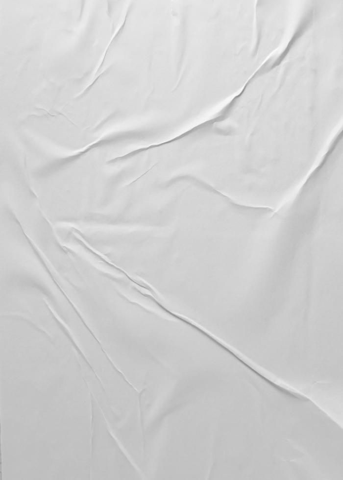 an image of white sheets that are wrinkled on the bed sheeting and pillow cases