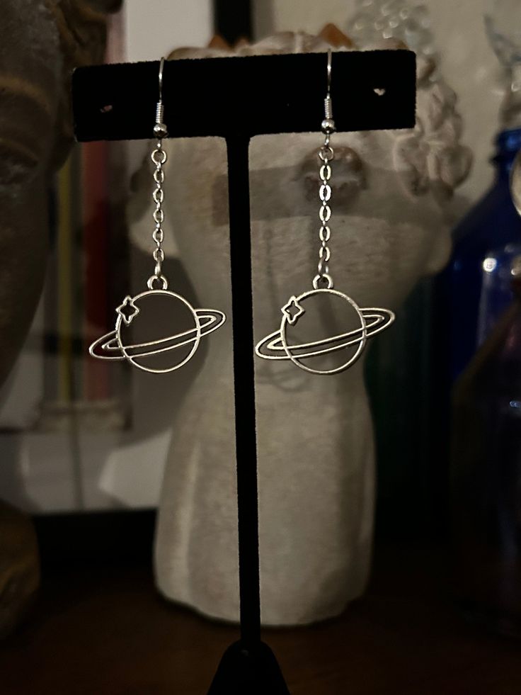 Planet Saturn Earrings Silver Tone Fun and Cute Earrings  Handmade Great Gift Idea Geek Chic Comes in a Gift Box Ships Immediately Silver Themed Earrings As A Gift, Cute Fun Earrings, Space Earrings Aesthetic, Handmade Space-themed Earrings For Gift, Handmade Space-themed Earrings As Gift, Space-themed Drop Earrings As Gift, Saturn Necklace Aesthetic, Moon And Saturn Earrings, Saturn Necklace Silver