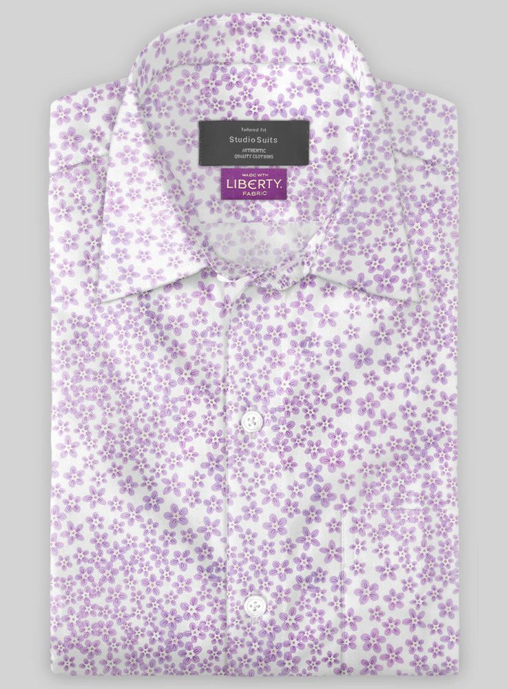 Channel a peaceful elegance with our Liberty Amati Cotton Shirt. Firstly, the shirt is constructed with pure cotton fabric that provides a delicate, supple and crisp yet easygoing style that evokes a laid-back vibe with a flowery pattern over a lavender shade.  Also, take a stylish turn with proficient tailoring with a relaxed fit and laid-back style that balances the edge and comfort that holds the sartorial limelight while attending the taste of summer tours and pool parties.  Made according t Relaxed Fit Dress Shirt For Summer Daywear, Spring Cotton Dress Shirt With Short Sleeves, Spring Cotton Relaxed Fit Dress Shirt, Summer Cotton Dress Shirt, Relaxed Fit, Spring Daywear Short Sleeve Dress Shirt, Summer Cotton Dress Shirt With Relaxed Fit, Relaxed Fit Cotton Dress Shirt For Summer, Elegant White Shirt With Floral Print, Elegant Short Sleeve Dress Shirt For Spring