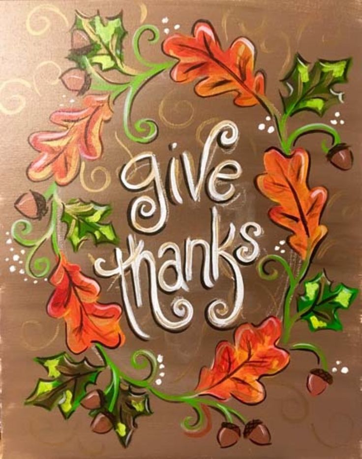 the words give thanks are painted on a metal plaque with leaves and acrylic paint