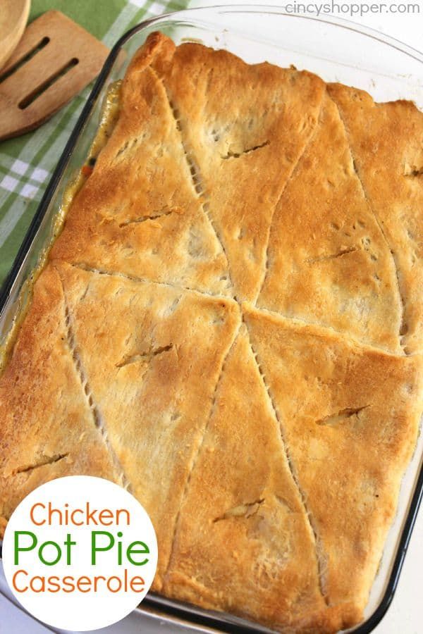 chicken pot pie casserole in a glass baking dish on a green and white checkered tablecloth