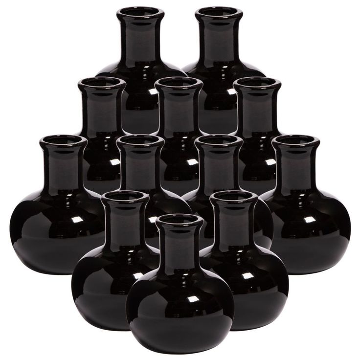 twelve black vases are arranged in a pyramid