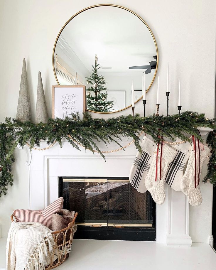 a fireplace with stockings hanging from it's mantle