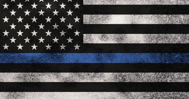 the thin blue line on an american flag is painted in black and white with silver stars