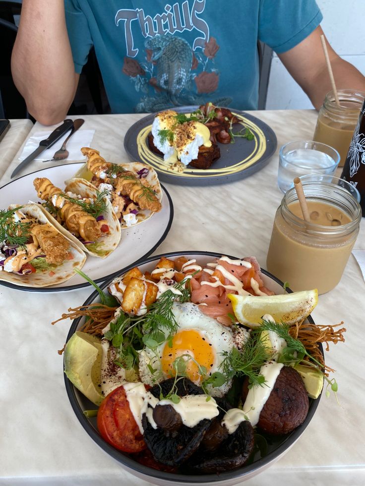 two plates of food on a table at a restaurant