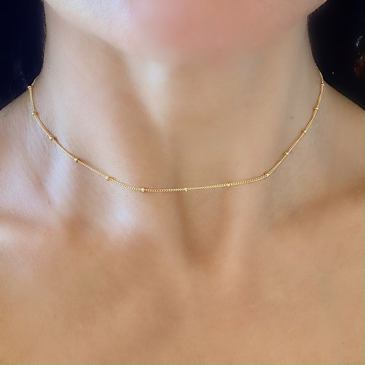 "Simple, elegant, dainty and durable gold satellite necklace! A perfect everyday necklace that layers beautifully with other chains! Easy to wear, super comfortable and made to last durability! Model is wearing our 14\" length ★ Worry Free Gold Chain Necklace - Handcrafted using only quality gold materials that will last. ★ Made with real 14/20 14K Yellow Gold Filled end to end ( chain + all components) - Necklace is NOT plated and with care will not fade or tarnish. ★ Quality grade materials to Satellite Necklace, Gold Ball Necklace, Gold Jewelry Gift, Gold Chain Choker, Gold Chain With Pendant, Gold Jewelry Simple, Ball Necklace, Necklace Simple, Everyday Necklace