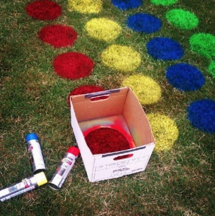 an open box with some paint on the ground