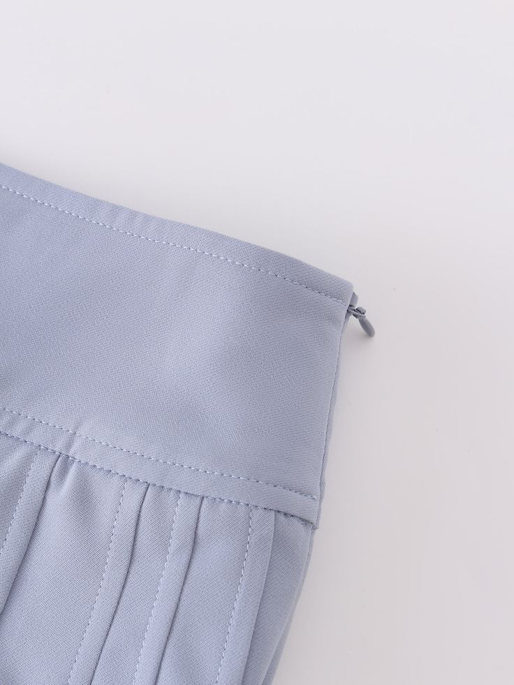 Expertly crafted with a stunning pleated design, the Yolk Pleated Skirt in Grey Blue offers 37 inches of sophisticated style. Elevate your wardrobe with this essential piece that effortlessly combines fashion and function. Elegant Pleated Skirt With Elastic Waistband, Elegant Long Gray Skirt, Elegant Gray Flowy Skirt, Formal Mini Skirt With Pleated Hem, Chic Blue Accordion Pleated Skirt, Elegant Blue Pleated Skirt With Accordion Pleats, Elegant Relaxed Fit Mini Skirt With Pleated Hem, Formal Skirt With Folds, Chic Gray Knee-length Bottoms