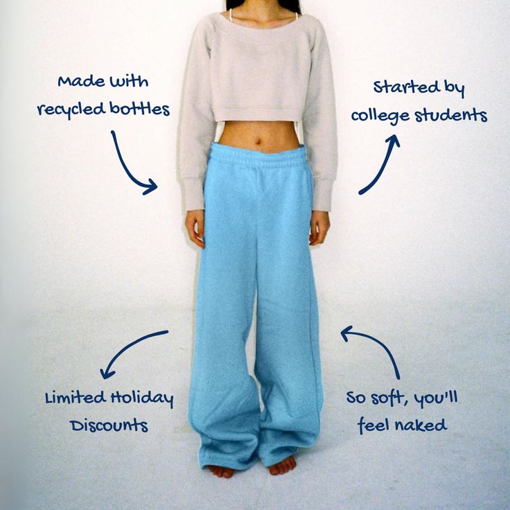 comfortable sweatpants with an elastic waistband and wide cuffs. Relaxed Fit High-waisted Sweatpants With Elastic Waistband, Trendy Relaxed Fit Sweatpants With Elastic Cuffs, Cozy Fit Sweatpants With Elastic Cuffs, Comfortable Cozy Sweatpants With Elastic Cuffs, Trendy Relaxed Fit Joggers With Ribbed Cuffs, Casual Baggy Sweats With Elastic Waistband, Relaxed Streetwear Bottoms With Ribbed Cuffs, Sporty Blue Pants With Elastic Cuffs, Leisure Sweatpants With Elastic Cuffs For Fall