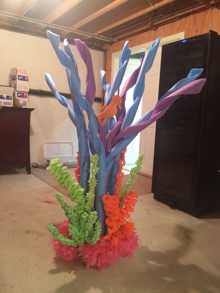 there is a vase that has some colorful flowers in it