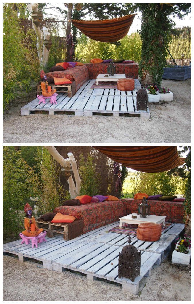 an outdoor seating area made out of pallets and wooden planks with pillows on top