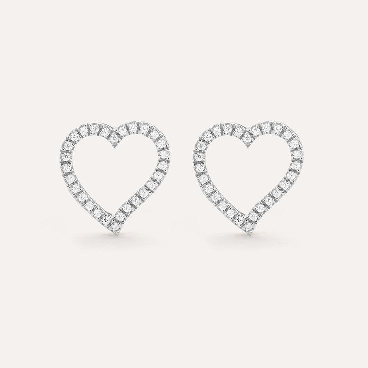 SKU# E-10157 Diamond Weight 0.10cts Earring Length 10.0 mm Thickness 1.60 mm Post back closure Finish 14k gold plated sterling silver or in sterling silver. Avoid contact with anything containing derivatives of alcohol. Valentine's Day Round Cut Diamond Earrings, Elegant Diamond Heart Earrings For Pierced Ears, Anniversary Huggie Diamond Earrings, Elegant Diamond White Heart Earrings With Prong Setting, Valentine's Day Round Cut Diamond Earrings With Prong Setting, Elegant Formal Heart Earrings With Prong Setting, Elegant Prong Setting Earrings For Valentine's Day, Elegant Heart-shaped Brilliant Cut Earrings, Elegant Formal Heart Earrings