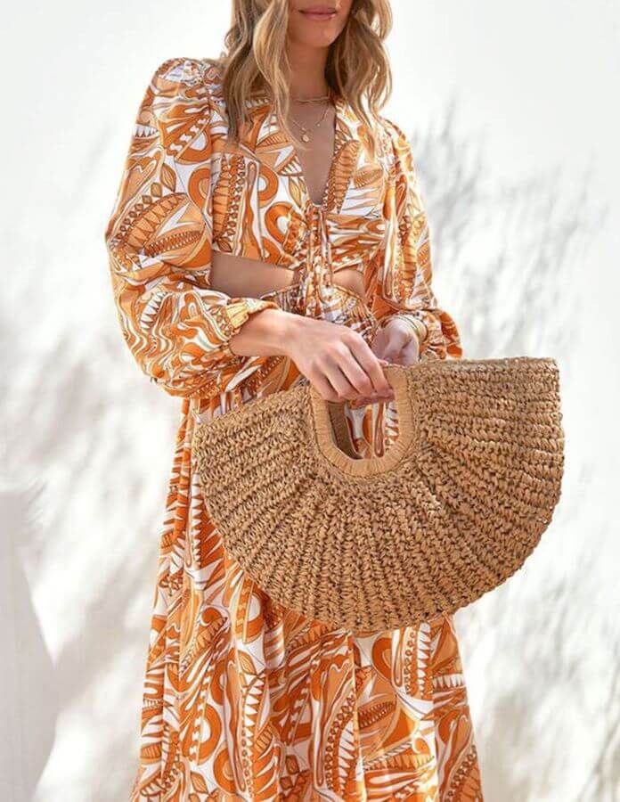 A must-have handbag for those sunny days and beyond. Crafted with natural raffia material, this curved handbag exudes a charming and stylish appeal that's sure to elevate your summer look. Chic and On-Trend: Our Half-Moon Straw Bag features a curved design that adds a touch of modernity and elegance to your outfit. Stay on-trend with this fashionable and eye-catching handbag that complements your style flawlessly. Eco-Friendly Raffia Material: Embrace the beauty of nature with this handbag, as i Beige Bags With Bamboo Handle For Summer, Bohemian Tote Bag For Summer Outings, Beige Bohemian Beach Bag For Summer Outings, Bohemian Beach Tote Bag For Summer Outings, Bohemian Tote Beach Bag For Summer Outings, Trendy Beach Shoulder Bag With Bamboo Handle, Chic Beach Bags With Bamboo Handle, Eco-friendly Brown Straw Bag For Day Out, Summer Vacation Bags With Bamboo Handle