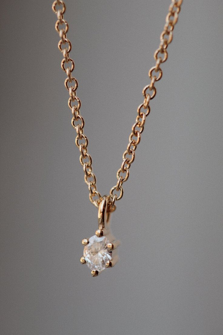 Smooth curves and delicate shimmer define this drop. Available in 14k white, yellow, and rose gold Recycled Oval Diamond: 3 x 2.3mm, 0.08 carats, GH VS Fine 16" cable chain Made in Toronto, Canada Each piece is made-to-order with care and special attention to detail. Please allow 3-5 weeks for items to ship. Dainty Yellow Gold Teardrop Solitaire Necklace, Yellow Gold Drop Necklace With Oval Pendant, Yellow Gold Jewelry With Delicate Chain And Oval Pendant, 14k Rose Gold Jewelry With Single Diamond, 14k Rose Gold Single Diamond Jewelry, Gold Dainty Solitaire Necklace With Rose Cut Diamonds, Rose Gold 14k Gold Solitaire Necklace With Delicate Chain, Gold Oval Pendant Jewelry With Diamond Accents, Dainty 14k Rose Gold Jewelry With Single Diamond