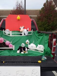 there are stuffed animals in the back of a truck